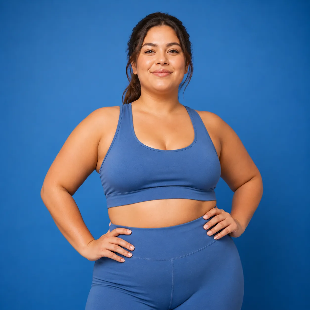A confident Control RX patient wearing blue activewear